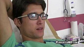 This sexy hunk doctor is getting blown in the office porn video